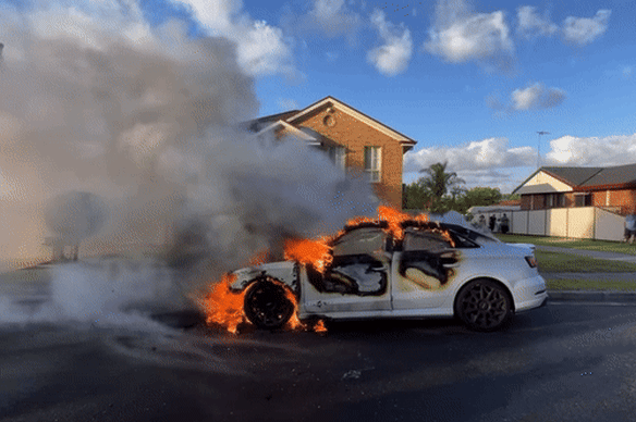 NSW Fire & Rescue were called to a car set alight a suburb over from the fatal shooting.