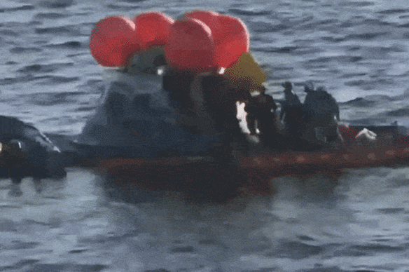 The Artemis II crew members emerge.