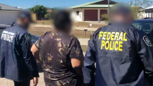 Two men have been arrested near Newcastle and Cairns for connection with an alleged attempted people smuggling venture.