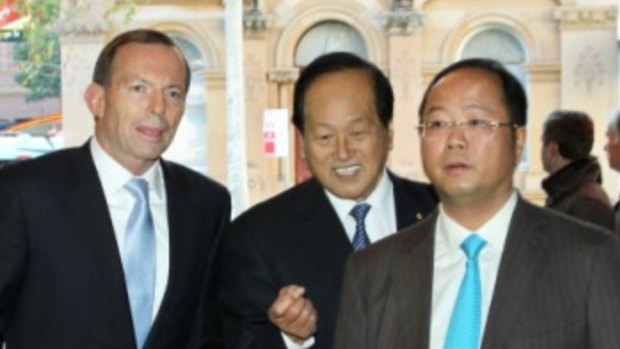 Huang Xiangmo with former prime minister Tony Abbott.