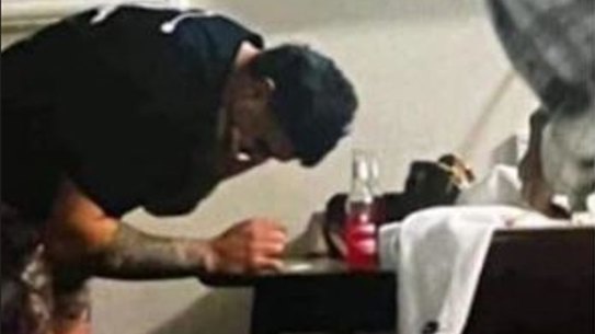 Latrell Mitchell in the photo.