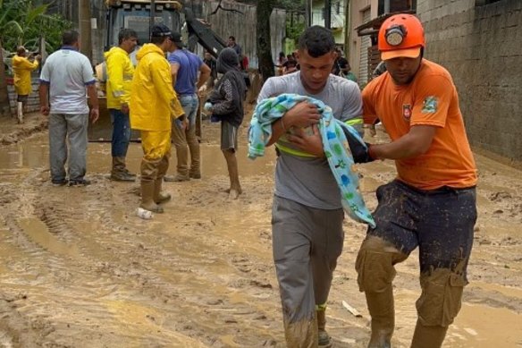 A baby was rescued in Sao Sebastiao, Brazil, as floods and landslides killed more than 30 people along the country’s south-eastern coast.