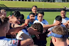 Manly players celebrate with Joey Walsh.
