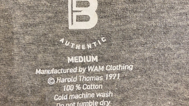 A Buddy Franklin Authentic T-shirt label.