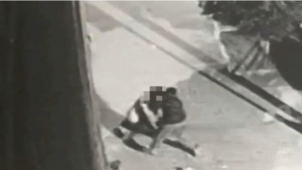 The Australian woman tried to kick her attacker in the groin before he fled.