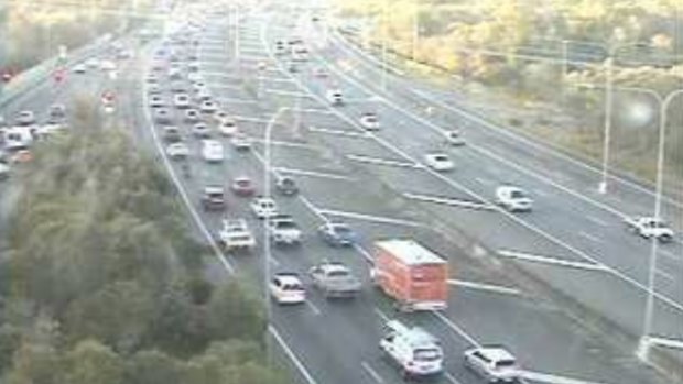 A south-facing traffic camera captures the delays on the Bruce Highway at Mango Hill just before 7am.
