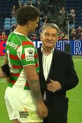 Latrell Mitchell and Roosters chairman Nick Politis embrace last Friday night at Allianz Stadium.