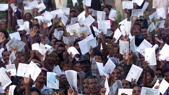 Huge crowds of East Timorese defied threats of violence to flock to polling stations, dressed in their Sunday best, clutching their identification papers.