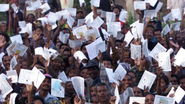 Huge crowds of East Timorese defied threats of violence to flock to polling stations, dressed in their Sunday best, clutching their identification papers.
