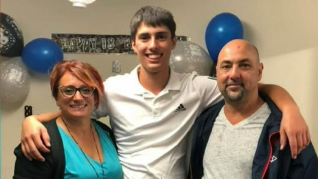 Christopher Cassaniti (centre) was crushed after scaffolding fell on him at a Macquarie Park worksite.