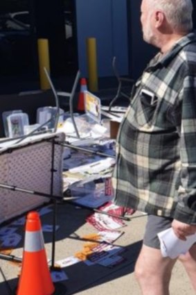 The wanted man and the mess he left behind at the Browns Plains polling booth last Friday.