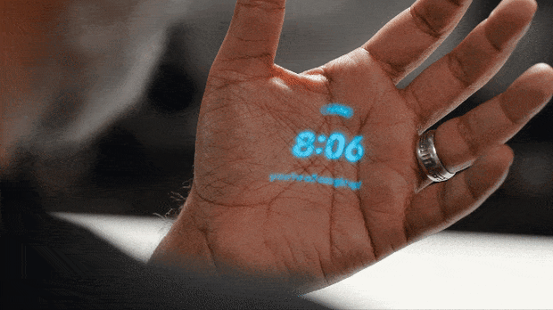 The AI Pin has a projector for displaying on your hand.