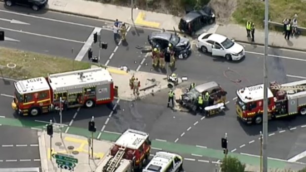 Emergency services attend the serious accident on the Chandler Highway on Sunday afternoon. 