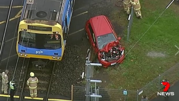 A woman has escaped injury after she drove into the path of a Frankston-bound train in Mentone.