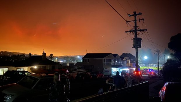 People awake to a red sky at 7am over Bermagui, on NSW's South Coast. 