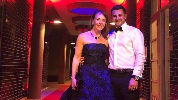 Melissa Caddick, wearing a sapphire and diamond necklace, with husband Anthony Koletti. 