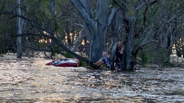 A woman aged in her 70s is lucky to be alive after she was swept away in floodwaters in Elmore.