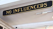 Pictured: The ‘No influencers’ sign in question. 