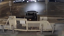 The ute reversed before ramming into the gates, with the incident being captured on CCTV.
