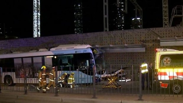 A teenage girl is in hospital after she was pinned under a bus when it crashed into a shelter in Parramatta.