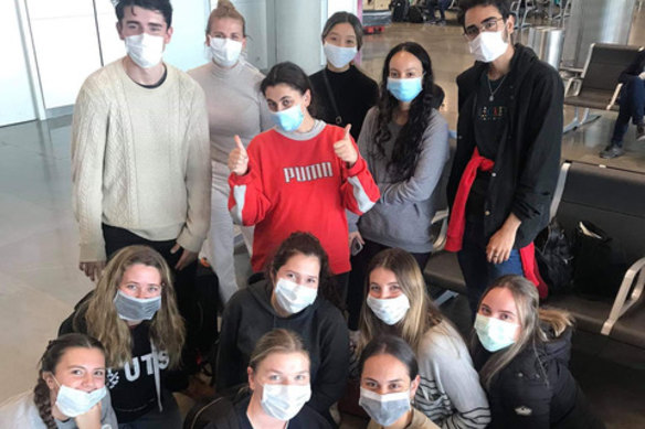 Fleur Connick (second row from the front, and second from right) with her fellow UTS exchange students at Madrid airport as they prepare to fly home. 