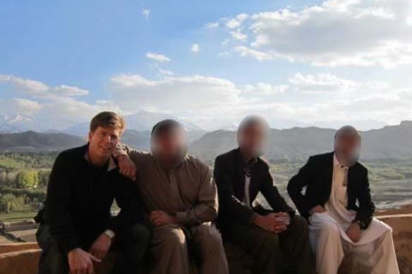 Geoff Peterson with some of his colleagues during his time working as an aid worker in Afghanistan. Faces have been blurred for safety reasons.