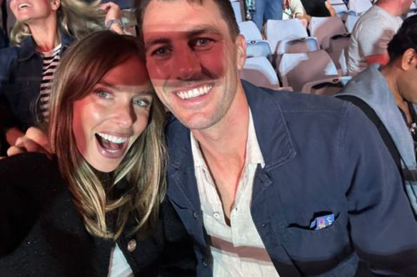 Becky and Pat Cummins attend the Coldplay concert in Sydney.