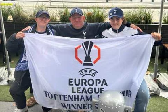 Australia Spurs supporter group president Sean Bielski, middle, celebrates Tottenham’s Europa League title with his sons Luca and Yasha.