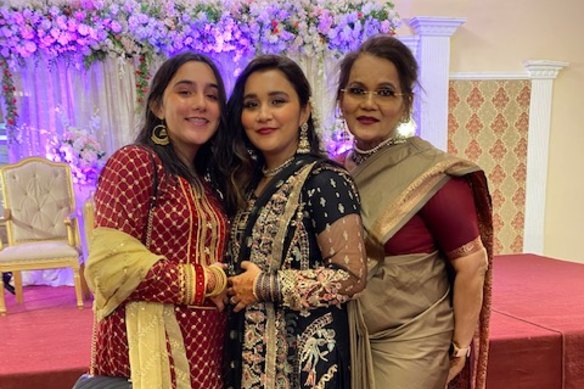 Saman Shad in Pakistan with daughter Milan (left) and mother Yasmeen (right).
