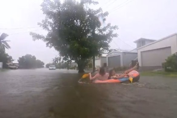 With six Townsville suburbs ordered to evacuate, some residents are taking to the water by whatever means possible. 