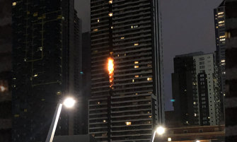 Flammable cladding on the Neo 200 apartment tower in Spencer Street burnt in February. The tower will now get public funding to remove any remaining flammable cladding.