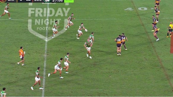 Tom Burgess turns to run from the field after Souths officials creamed at him to come off.