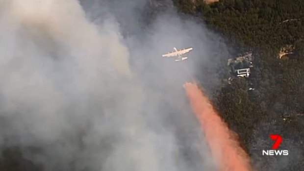 A firefighting aircraft battling the Buninyong bushfire