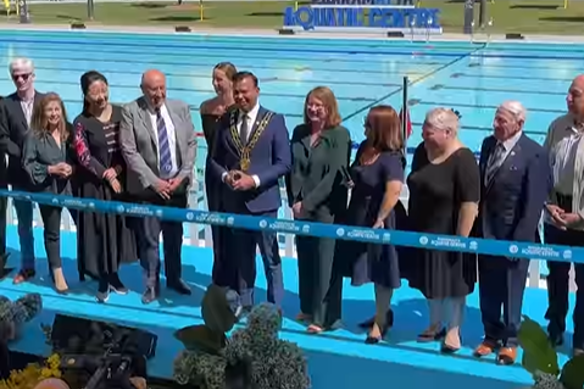 Parramatta’s Lord Mayor Sameer Pandey, centre, with former lord mayor Donna Davis, to the right, and other councillors, at the official opening of the Parramatta Aquatic Centre on Monday.