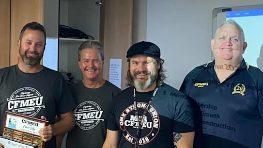 Dean Mattas (second left) receiving the 2020 Delegate of the Year award at a CFMEU event with Michael Ravbar (third from left), Jade Ingham (second right) and Royce Kupsch (far right).