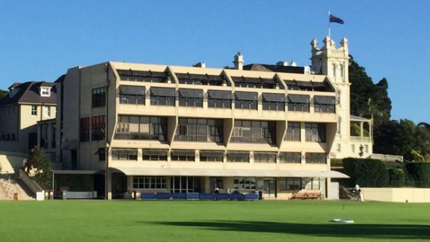 The existing library, built in 1988, with the tower of Aspinall House in the background. 