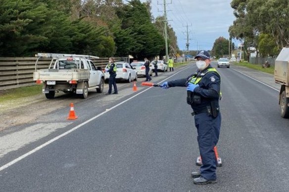 Vehicle checkpoints on the Surf Coast on Thursday. 