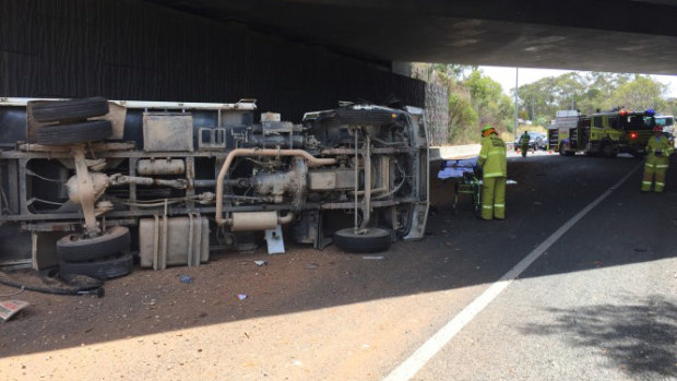 A truck rolled over on Parkes Way under the Caswell Drive underpass on Friday afternoon.