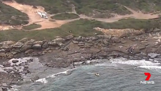 Two rescue helicopters joined the search after three people were thrown in the water when a boat capsized in Cronulla.