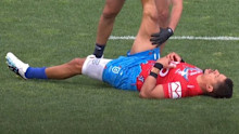 Dane Gagai receives attention for a hamstring injury.