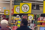 The 18-year-old fled to a busy Woolworths after being stabbed in Melbourne.