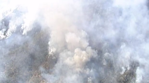 The Sarabah bushfire is generating thick smoke.