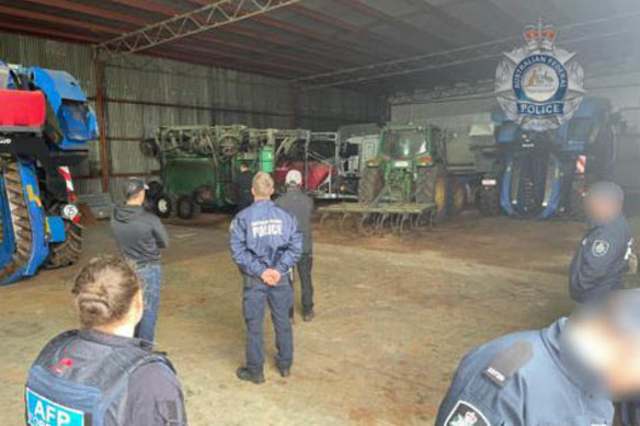 Police raid the Zirilli family farm last month.