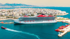 Manoeuvring the huge ship into port is all done manually by a team of five.