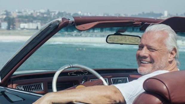 Jim Byrnes in his vintage Cadillac.