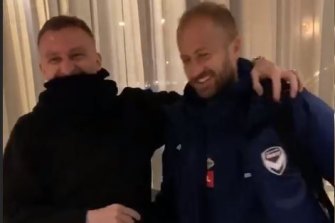 Besart Berisha and Migjen Basha share a moment after their flight was cancelled.