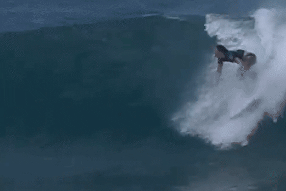 Tyler Wright nails a barrel at Pipeline.