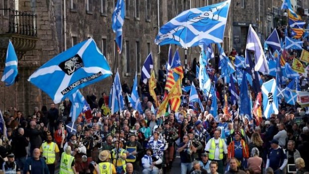 Tens of thousands marched in Edinburgh on Saturday in support of a renewed push for Scottish independence.