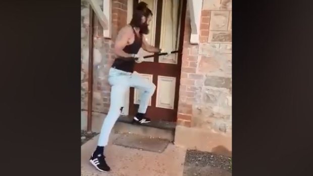 A still from the video shared by New Westralia members shows the historic courthouse door being forced open.