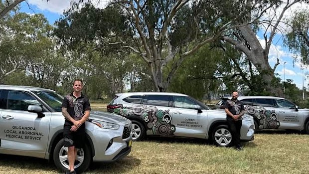 Executive officer Beau Ewers and chief executive Phil Naden with new CTG Aboriginal Health vehicles.